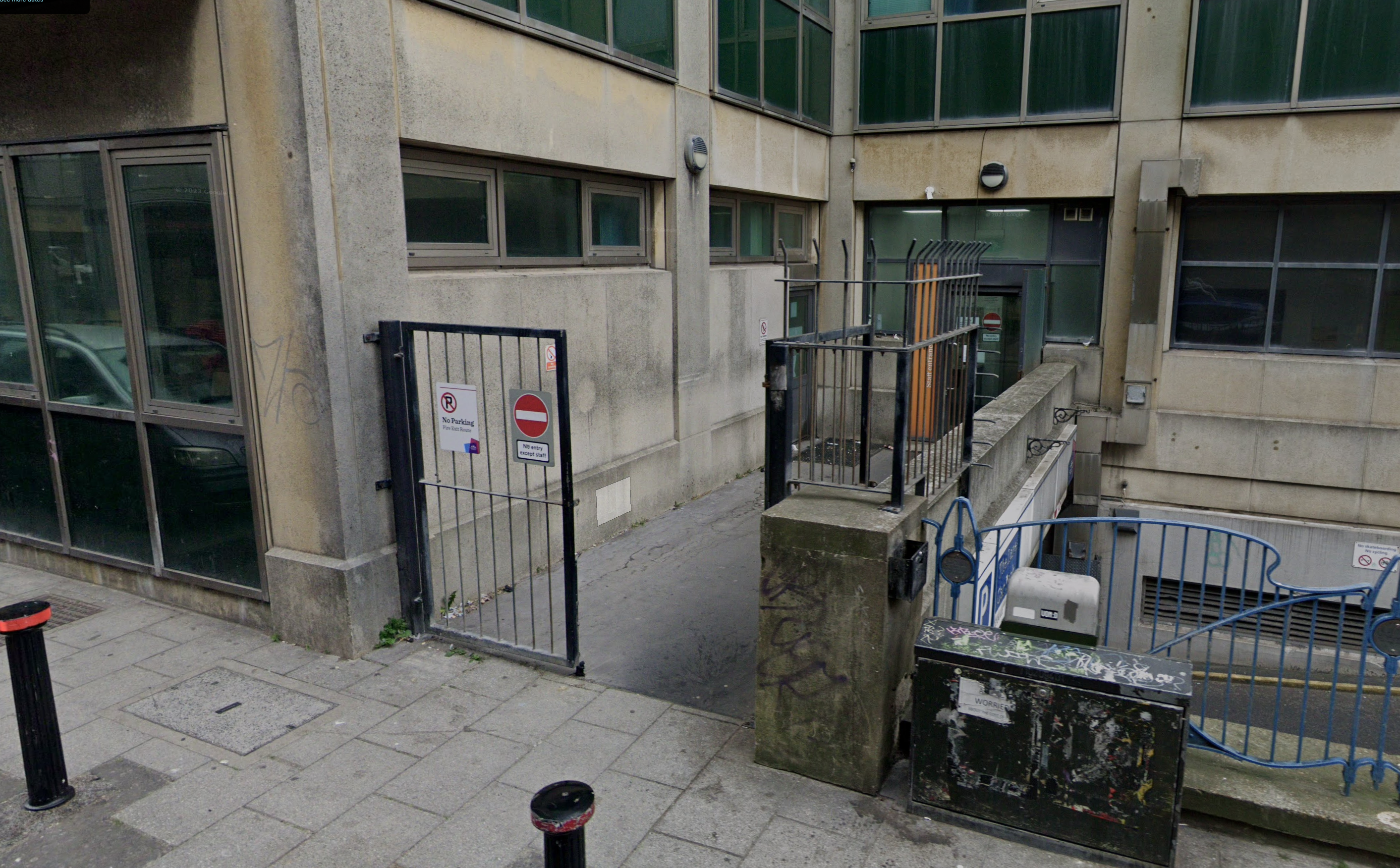 Entrance to Freedom Works Brighton, Barts House -- a black metal gate on Black Lion Street